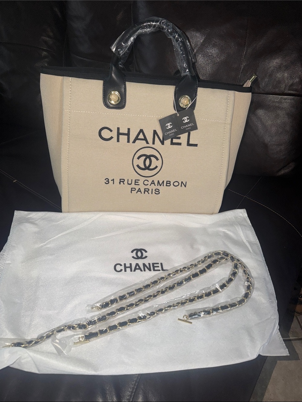 Fashion Beige Canvas Tote with Black Trim and Logo and dust bag